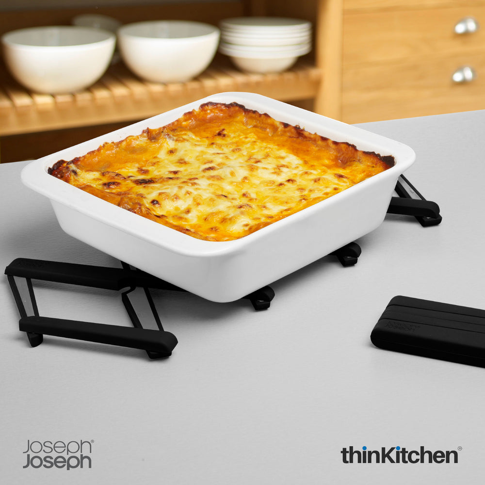 Joseph Joseph International Expandable Silicone Trivet – Stretch, Black| Heat-Resistant, Space Saving