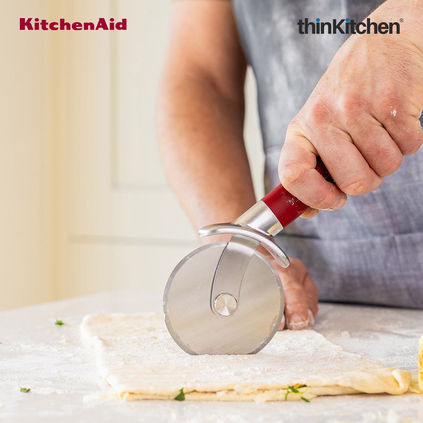KitchenAid Stainless Steel Pizza Cutter with Finger Guard - Empire Red, 23.5cms